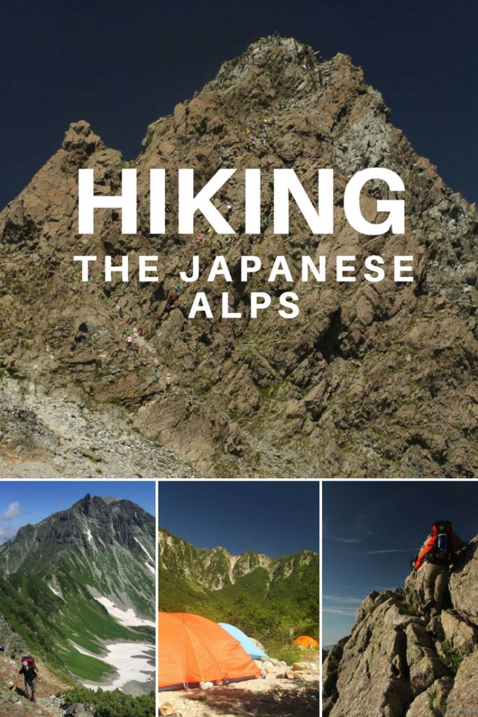 Rocky peak of Mount Asahi-dake with blue skies, a person with backpack hiking a ridgeline, snow and colourful tents in the mountain.