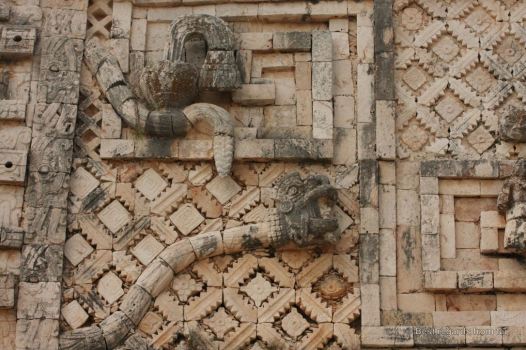 Details: feathered snakes with open fangs, Uxmal, Mexico