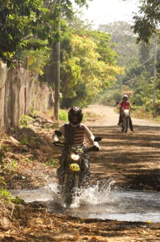 Small river crossing with our motorbikes on Ometepe island, Nicaragua