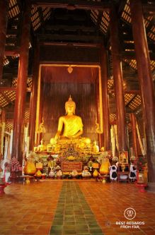 Sacred Buddha inside Wat Phan Tao, Chiang Mai, Thailand