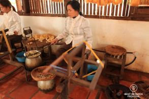 Boiling and spinning the golden silk cocoons, Siem Reap, Cambodia