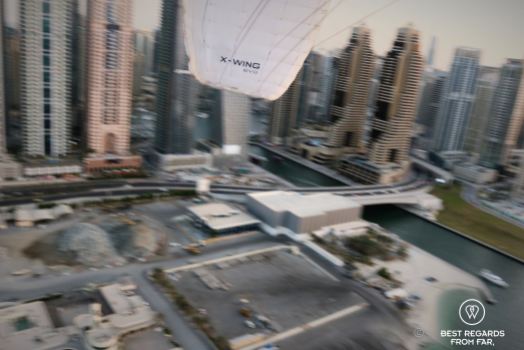 Acrobatics before landing the paramotor, Dubai, UAE