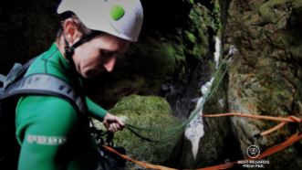 Marthinus Esmeyer is setting up the ropes to slide down, canyoning George, South Africa