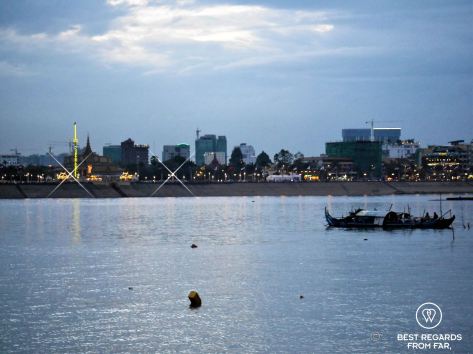 Skyline of Phnom Penh from a sunset Mekong cruise, Cambodia