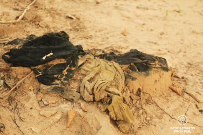 Clothes of one of the many victims in the mass grave, Phnom Penh Killing Fields, Cambodia