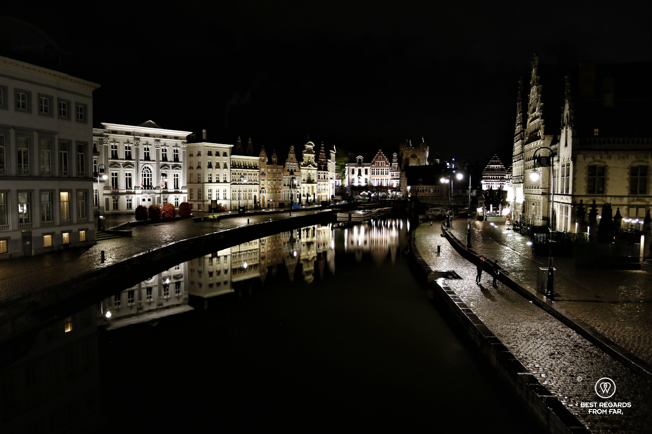 Reflections of medieval buildings in the Lys River along the Graslei in Ghent, Belgium